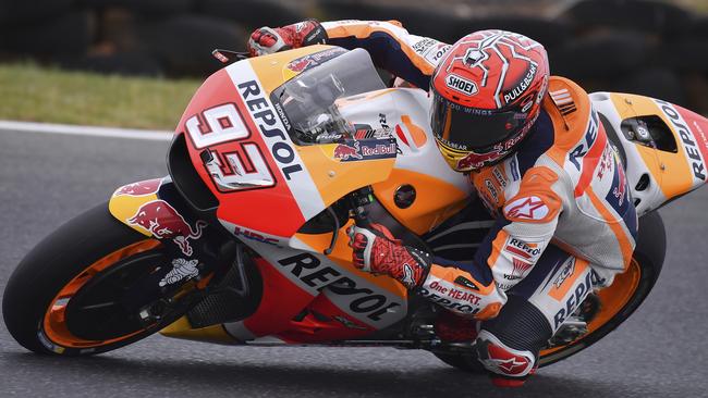 Spain's MotoGP rider Marc Marquez steers his Honda during qualifying for the Australian Motorcycle Grand Prix at Phillip Island near Melbourne, Australia, Saturday, Oct. 21, 2017. (AP Photo/Andy Brownbill)