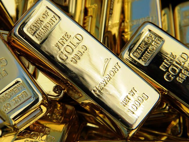 Memory sticks in the likeness of gold bars are displayed at Newmont Mining Corp.'s Boddington Gold mine, in Boddington, Western Australia, on Wednesday, Feb. 3, 2010. The $2.9 billion Boddington Gold operation is Australia's biggest gold mine. Photographer: Carla Gottgens/Bloomberg