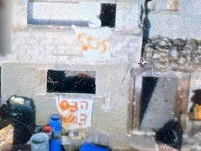 Signs calling for help were found in a building after three Israeli hostages were accidentally shot by the IDF. Picture: IDF