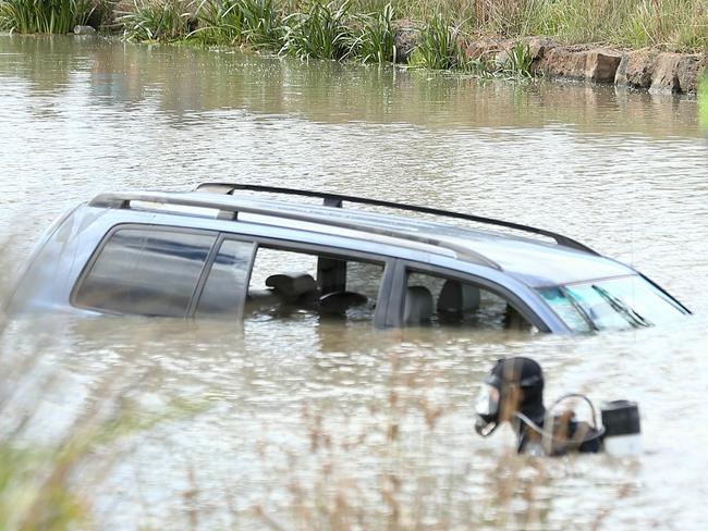 Akon Guode's plunged into a lake off Manor Lakes Blvd. Picture: Mark Stewart