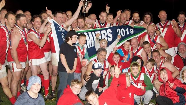 Healesville celebrates its veterans grand final win