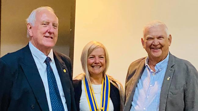 (Left to right) Outgoing president of Gympie-Cooloola Rotary Club Gary Davison, incoming president of combined clubs Karen Gresham, and outgoing president of Gympie Rotary Club Dennis Grenshaw at the combined changeover dinner on June 22.