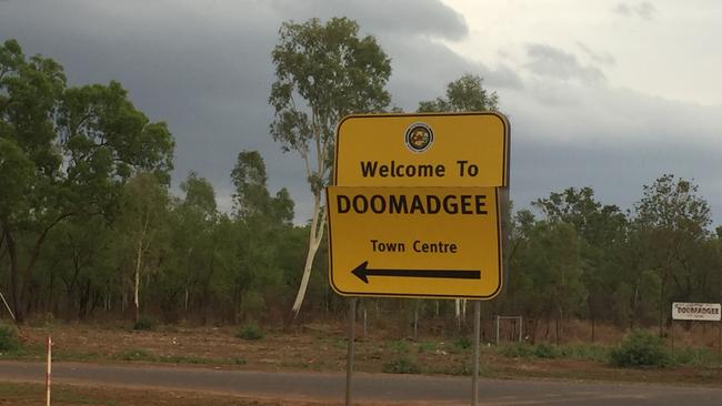 A sign at the entrance to the township of Doomadgee.