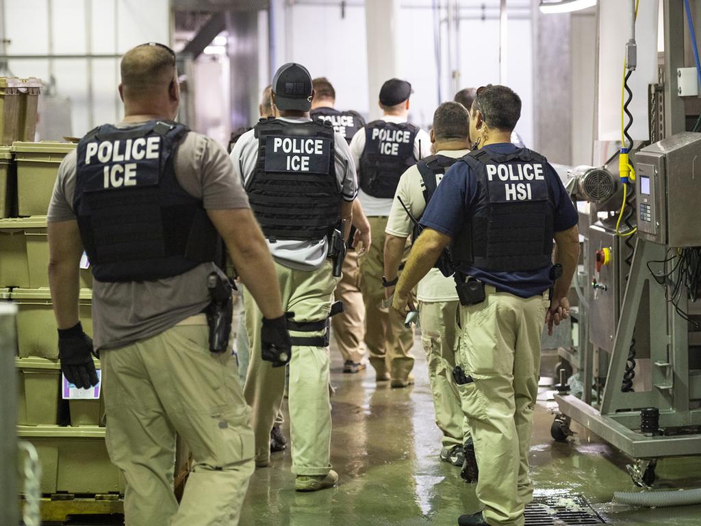 ICE and Homeland Security Investigations (HSI) officers execute search warrants in Mississippi on August 7, 2019. Picture: AFP