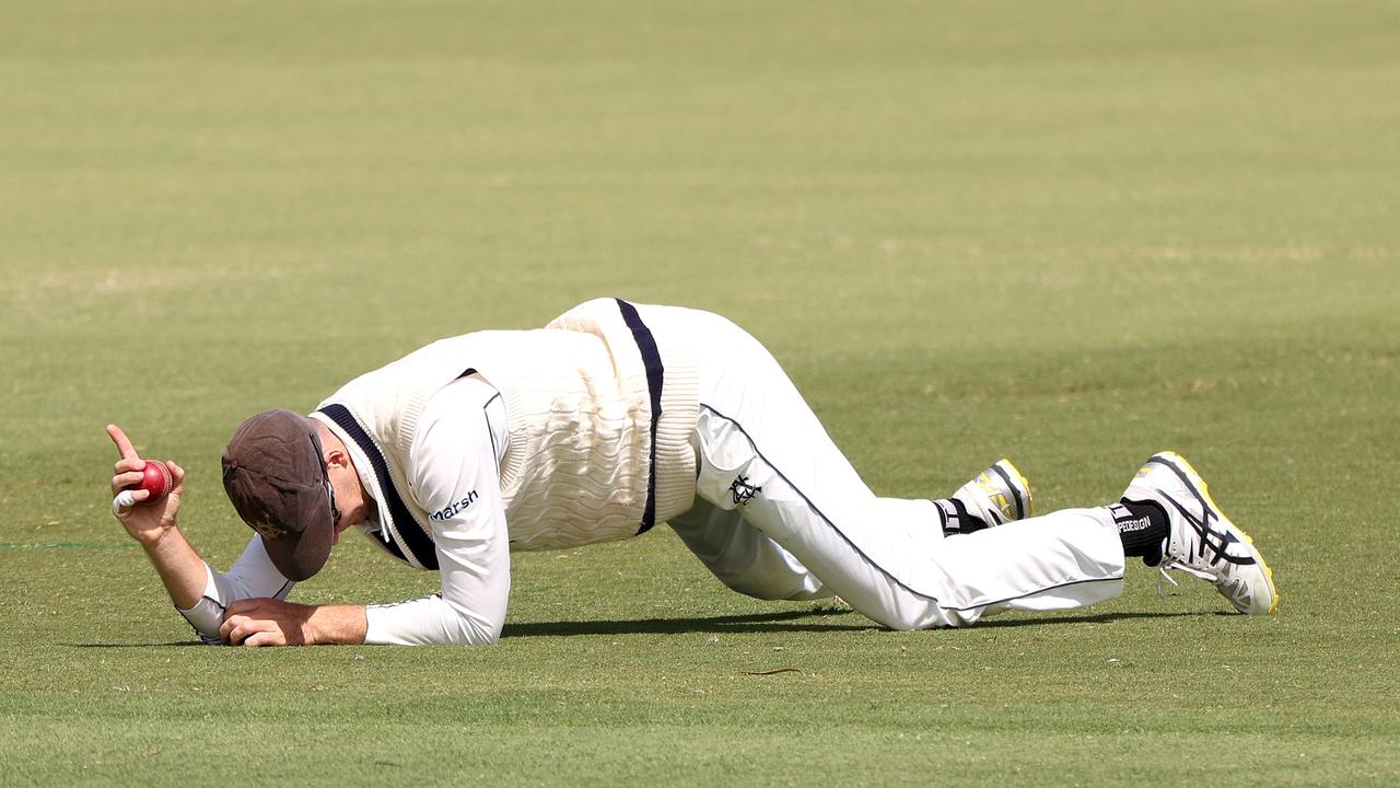 MELBOURNE, AUSTRALIA - FEBRUARY 18: Peter Handscomb of Victoria celebrates a catch during day one of the Sheffield Shield match between Victoria and Queensland at CitiPower Centre, on February 18, 2022, in Melbourne, Australia. (Photo by Jonathan DiMaggio/Getty Images)