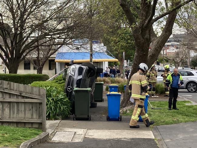 The Mercedes flipped after allegedly taking the roundabout at speed.