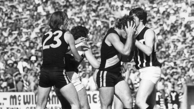 Chris Hercock, Tim Evans, Fred Phillis and Trevor Sorrell during the Port Adelaide v Glenelg grand final at Football Park in 1977.