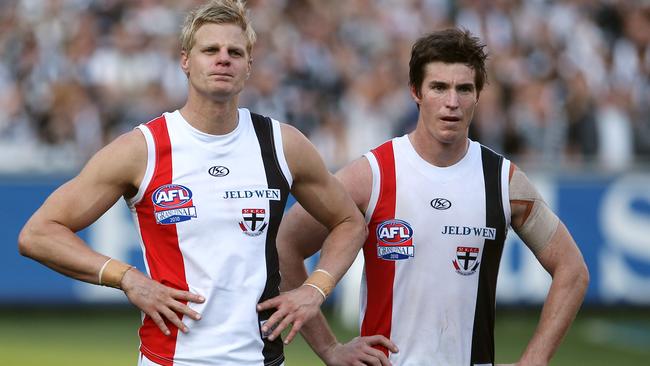 Nick Riewoldt and Lenny Hayes after losing the 2010 Grand Final.