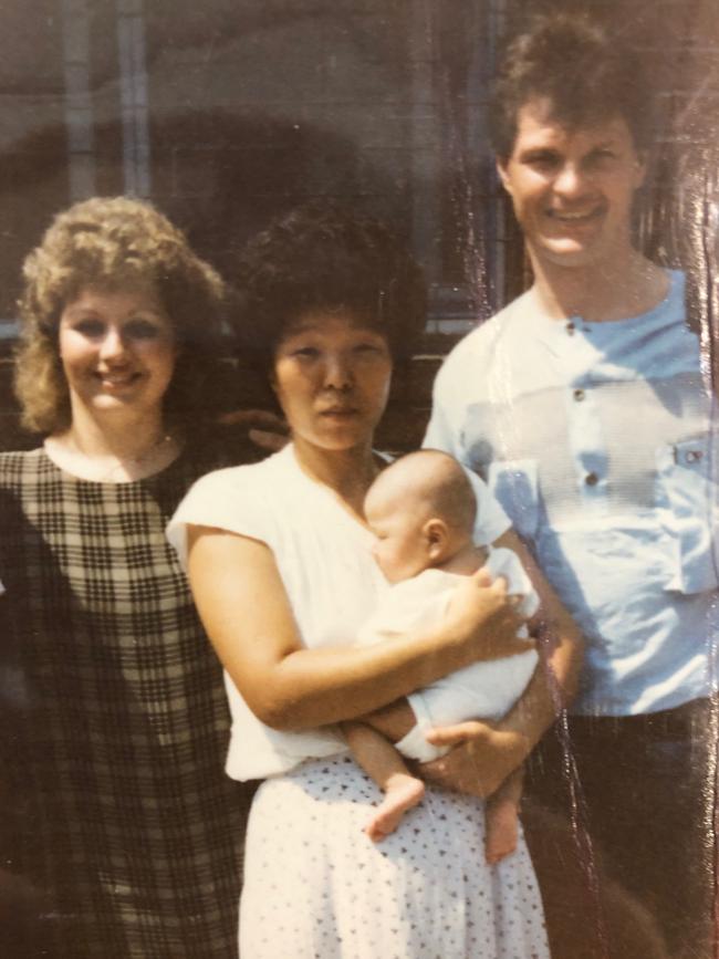 Shaylee Zerna with her adopted parents and foster mum at four months old. Picture: Supplied