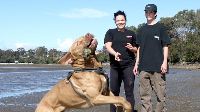 Bianca Fletcher and Noah Simpson, with pup Samson, Dog Gallery, at Sandgate Beach, Saturday 27th August 2022 - Photo Steve Pohlner