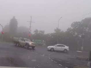 Dash cam footage has captured the moment two vehicles collided in thick fog at the turnoff for Murphys Creek Road and the New England Highway. Picture: Contributed