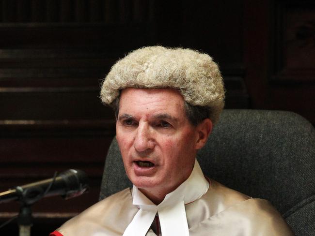 Justice Derek Price isn’t showing any signs publicly that he wants to step down from his role.