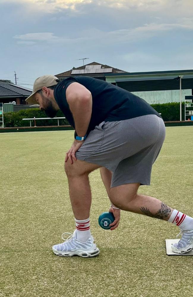 Aaron Woods playing lawn bowls