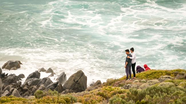 Arash Yari’s family wait on the shoreline for news. Picture: AAP/Mike Burton