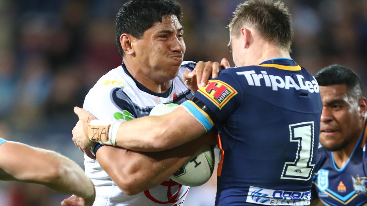 Jason Taumalolo busts through the Titans defence