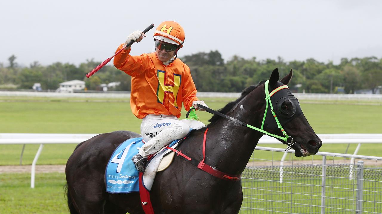 War General, ridden by Masayuki Abe, narrowly edges out Sylvester to win Race 3, the 900 metre Benchmark 60 Handicap at the Banana Industry Race Day, held at the Innisfail Turf Club. Picture: Brendan Radke