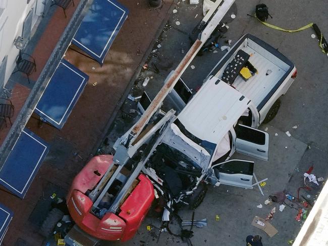 The pick-up truck that a man drove into a crowd on Bourbon St in New Orleans, killing 14 people. The driver was shot and killed by police. Picture: AP Photo/Gerald Herbert