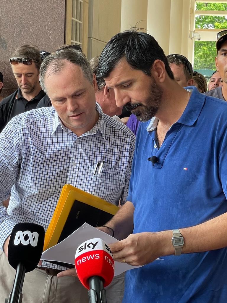 Lead plaintiff Mario Tsirvas and his lawyer Danial Kelly outside the Supreme Court after launching legal action against the Territory government's Covid-19 vaccine mandate. Picture: Jason Walls