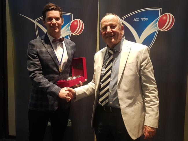 Plenty Valley's Callum Nankervis receives his award from VSDCA president Phil O'Meara. Picture: Ben Higgins