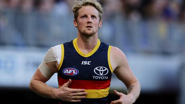 Crows co-captain Rory Sloane leaves the field with an eye injury against West Coast. Picture: Will Russell/AFL Photos via Getty Images