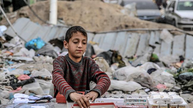 A vendor in an open-air market in Gaza City. Picture: AFP