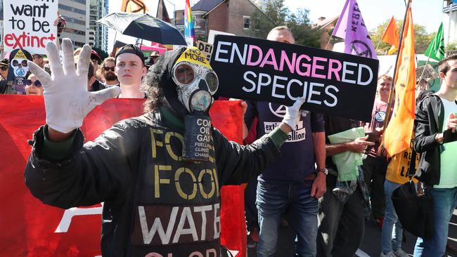 Extinction Rebellion protest blocking Margaret St, Brisbane. Picture: Liam Kidston.