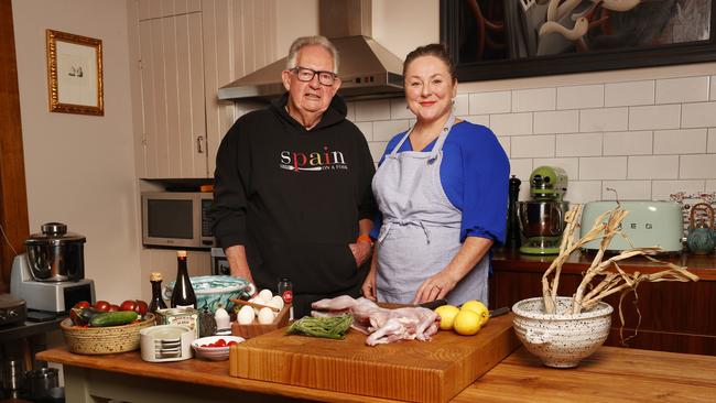 Supreme Court judge justice Stephen Estcourt with jeweller Shauna Pickin with cook rabbit and garlic scape sausages at the Koonya Garlic Festival. Picture: Nikki Davis-Jones