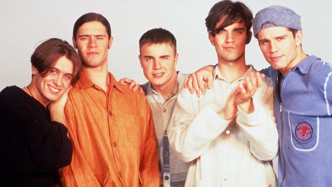 20/02/1996 PIRATE: Band pop group Take That members Jason Orange with Gary Barlow, Mark Owen, Robbie Williams and Howard Donald. band/take/that