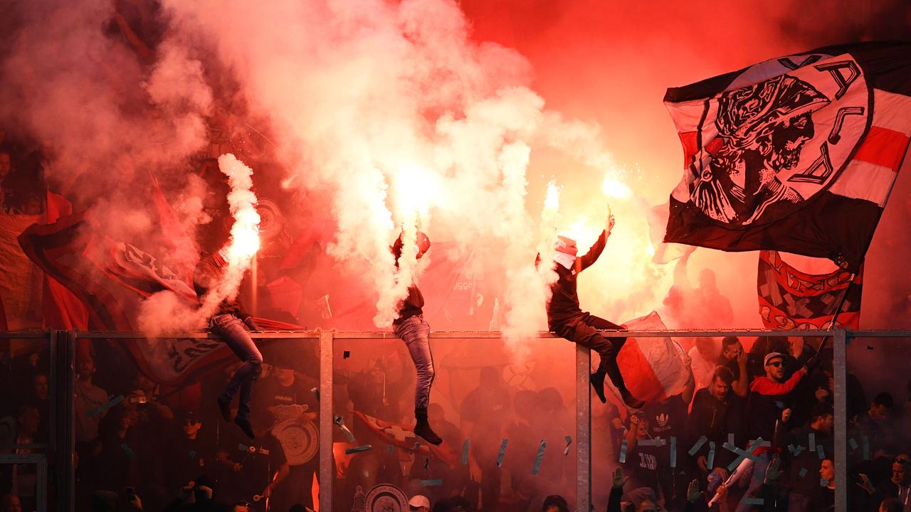Ajax supporters celebrate winning the domestic title