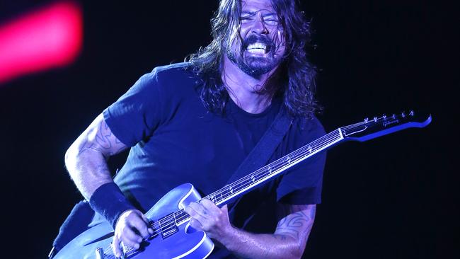 Tearing it up ... Dave Grohl in the Foo Fighters at ANZ Stadium. Picture: Bradley Hunter