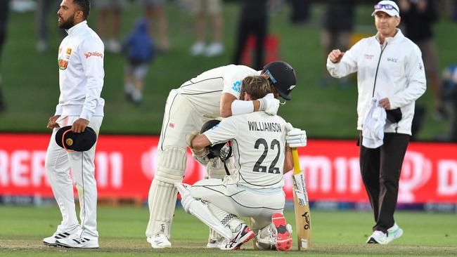 New Zealand's Neil Wagner hugs his teammate Kane Williamson after winning the first Test cricket match against Sri Lanka. Picture: AFP