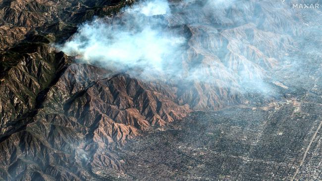 This satellite image shows smoke as the Eaton Fire continues to burn in Altadena, California. Picture: Maxar Technologies / AFP