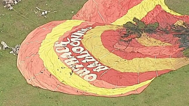 The hot-air balloon that caught fire before landing in Cahillton Road, Gruyere outside Melbourne. Source: Channel 9