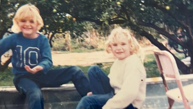 Nicole (right) with her sister Rebecca (left) when they were kids. Picture: Supplied by family