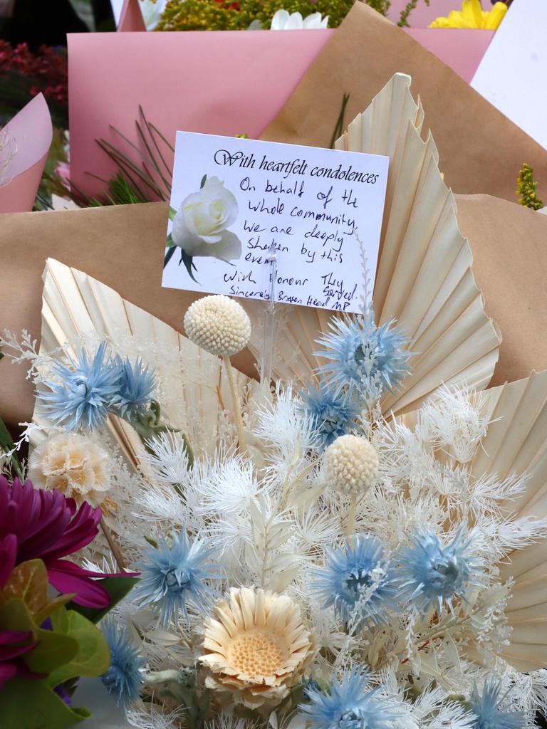 Residents of Chinchilla and Tara left flowers and gifts at the local police station to honour the fallen officers. Picture David Clark NCA/Newswire