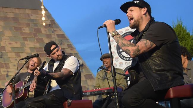 On the job ... Benji and Joel perform in Hollywood, California last month. Picture: Getty Images.