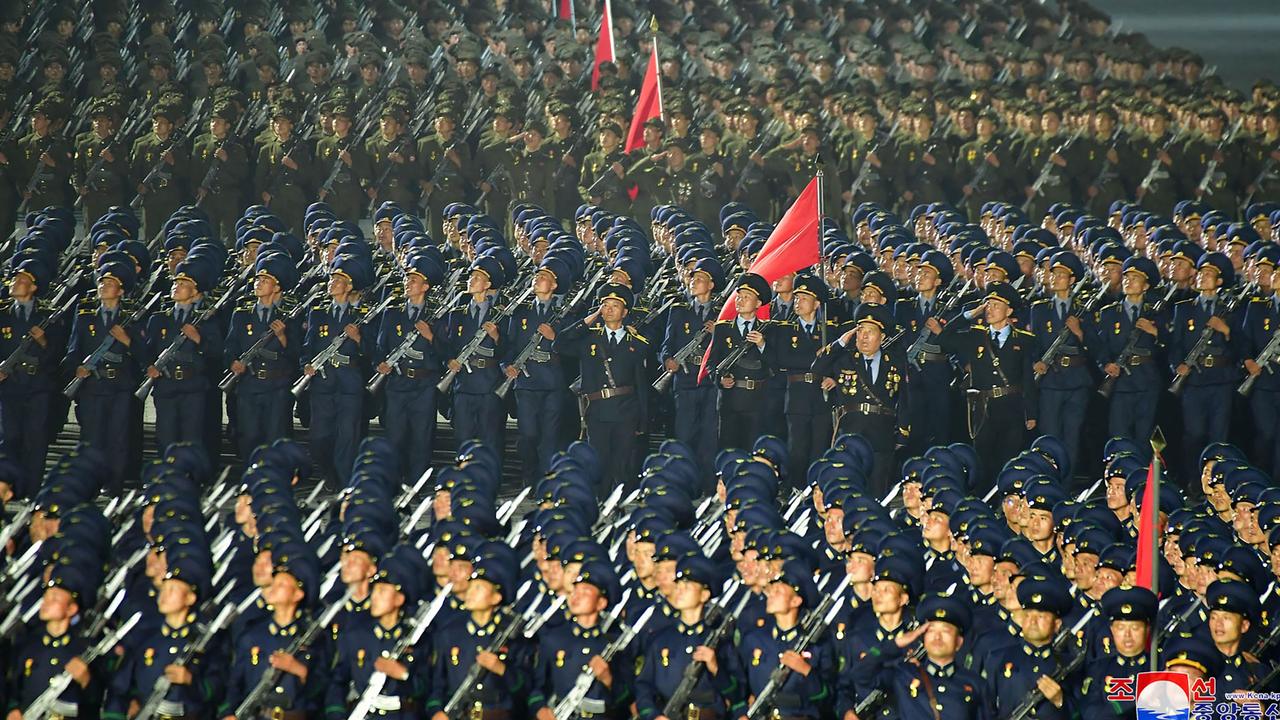 A parade of 'paramilitary and public security forces' celebrate the 73rd founding anniversary of North Korea. Picture: AFP PHOTO/KCNA VIA KNS