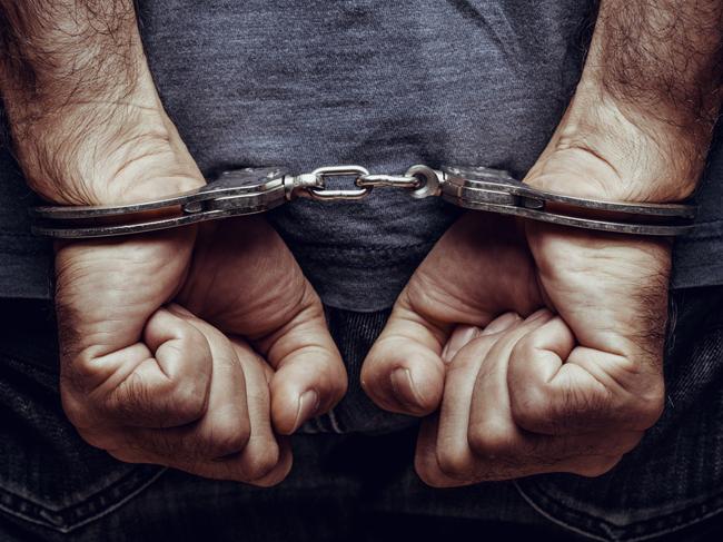 Arrested man in handcuffs. Photo: iStock