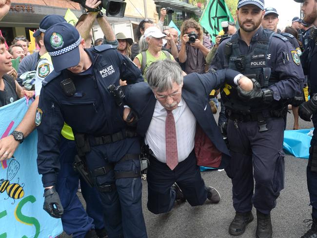 Environmental scientist Martin Wolterding being arrested at the Extinction Rebellion protest in Sydney, Monday, 7 October, 2019. Picture: AAP Image/Jeremy Piper