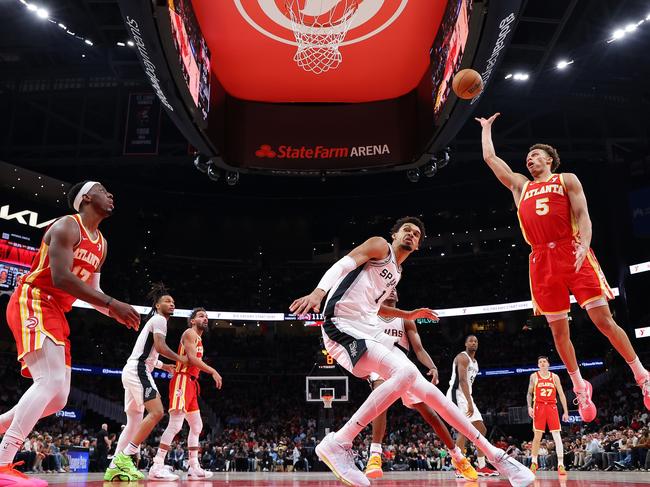 Dyson Daniels of the Atlanta Hawks attempts a shot against Victor Wembanyama of the San Antonio Spurs during the fourth quarter at State Farm Arena on February 05, 2025 in Atlanta, Georgia. Picture: Getty