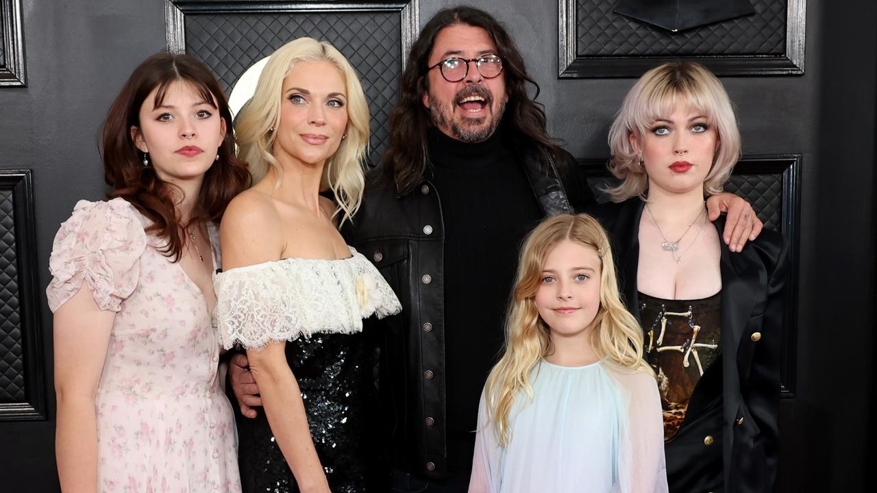 Foo Fighters frontman Dave Grohl with Jordyn Blum, his wife of 21 years, and their three daughters. Picture: Amy Sussman/Getty Images