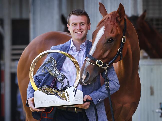 That’s racing, says Clayton Douglas, pictured with 2022 winner Giga Kick and the Everest trophy. Giga Kick is injured and won’t line up this year. Picture: David Caird