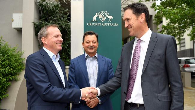 Cricket Australia's new CEO Kevin Roberts with outgoing CEO James Sutherland. (Photo by William WEST / AFP)