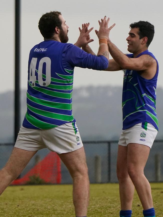 Ty Ellison (left) slotted three goals.