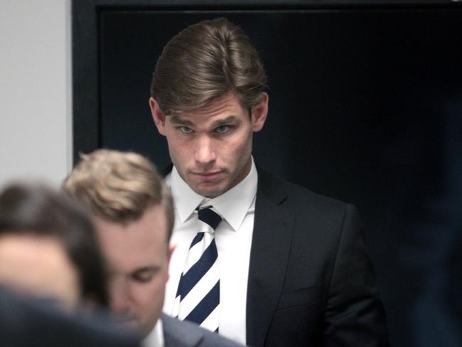 Geelong Cats forward Tom Hawkins leaves after his hearing at the AFL Tribunal in Melbourne, Tuesday, May 8, 2018. The Geelong forward has been suspended for one AFL game for making intentional contact with an umpire. (AAP Image/Stefan Postles) NO ARCHIVING