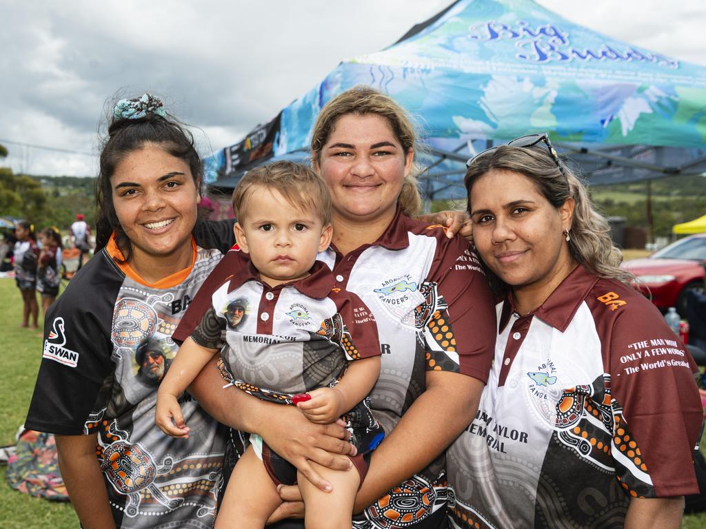 William Taylor Memorial players and supporters (from left) Akira Kelly, Kiara Taylor, holding son DJ Glenbar, and Mikala Logan-Gordon at the Warriors Reconciliation Carnival hosted by Toowoomba Warriors at Jack Martin Centre, Saturday, January 18, 2025. Picture: Kevin Farmer