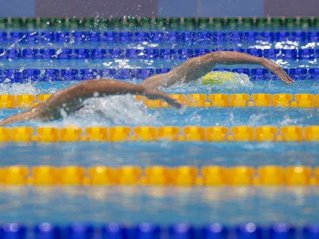 TOKYO, JAPAN - JULY 26:  Ariarne Titmus of Australia pulls away from Kathleen Ledecky of the United States on the final lap of the 400m Freestyle for Women during the Swimming Finals at the Tokyo Aquatic Centre at the Tokyo 2020 Summer Olympic Games on July 26, 2021 in Tokyo, Japan. (Photo by Tim Clayton/Corbis via Getty Images)