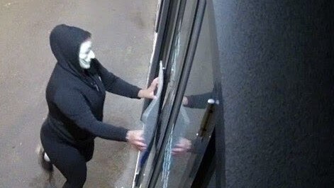 The masked vandal was caught on camera.