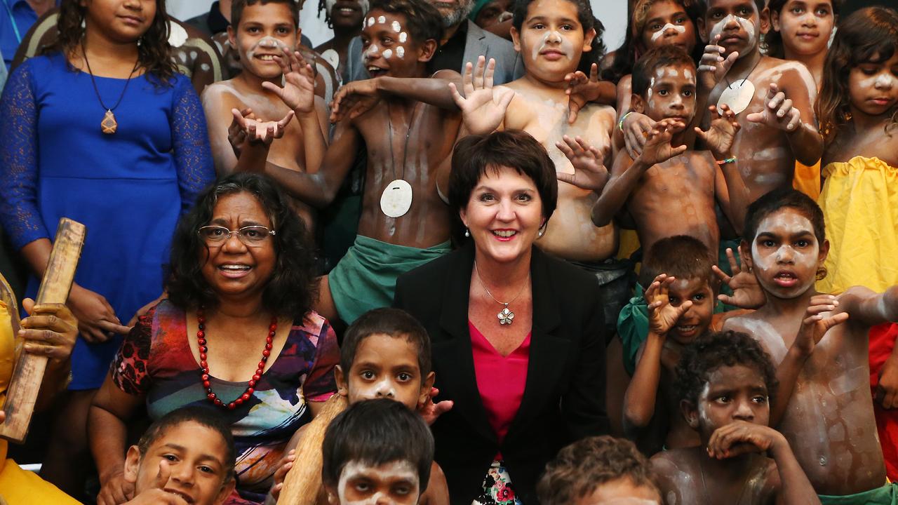 The 2014 Australian Tourism Exchange has officially begun with a Welcome To Country by the Gimuy Walubara Yidinji dancers for VIP delegates at the Cairns Convention Centre. Traditional owner of Cairns Henrietta Marrie and Queensland Tourism Minister Jann Stuckey are surrounded by young Gimuy Walubara Yidinji dancers. Picture: Brendan Radke.