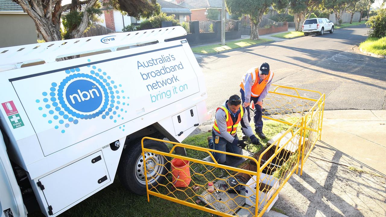 Workers installing the National Broadband Network.